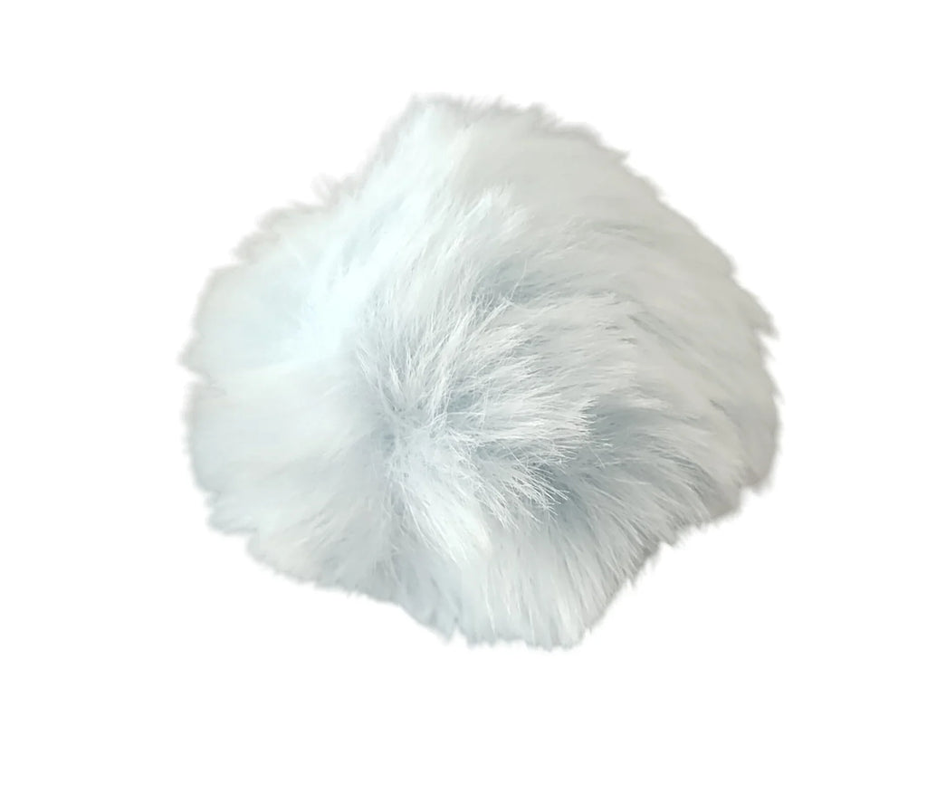 Soft white faux fur pompom on white background, crochet accessory by Croch'pelotes by Sophie